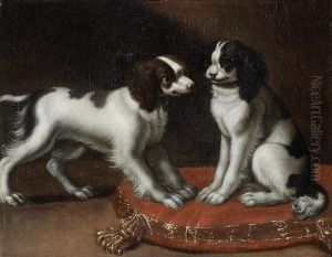 Two Spaniels On A Cushion