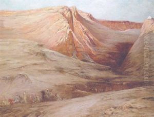 An Arab Caravan In A Rocky Desert Landscape