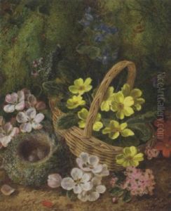 Primroses, Primulas, Apple Blossom With A Bird's Nest And Eggs And A Wicker Basket, On A Mossy Bank by George Clare