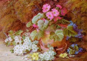 A Geranium In A Flower Pot With Primroses, May Blossom And African Violets On A Mossy Bank by Vincent Clare