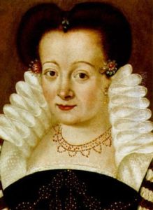 A Portrait Of A Lady, Wearing A Black Dress Adorned With Red And White Lace And Coral Beads