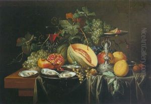 Still Life Melons, Pomegranates, Grapes And Other Fruits All On A Table Draped With A Grey Cloth by Alexander Coosemans