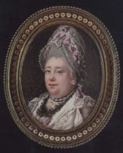 A Middle-aged Lady Wearing White Lace Bonnet With Ribbon, White Dress With Mauve Bodice, White Lace Collar And Trim... by Samuel Cotes