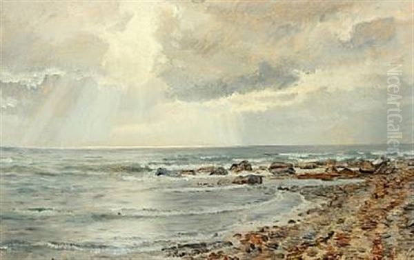 Coastal Scenery With The Sun Shining Through The Clouds - view 1