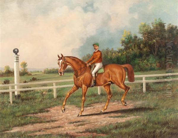 Chestnut Racehorse With Jockey Up On A Training Track With A Wooded Landscape Beyond - view 1
