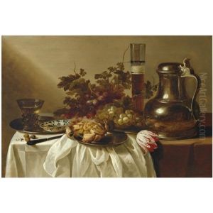 Still Life With A Pewter Flagon Together With A Glass Of Beer, A Crab, A Blue-and-white Dish And A Roemer On Pewter Dishes, Together With A Knife, Hazelnuts, A Tulip And Bunches Of Grapes On A Table P