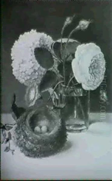 A Nest With Birds' Eggs Beside A Glass Beaker With Flowers - view 1