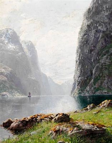 View Of A Norwegian Fjord With A Sailing Ship Between Tall Cliffs - view 1