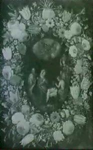 A Garland Of Flowers Surrounding An Oval Scene Of The       Nativity
