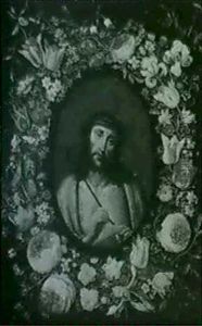 A Garland Of Flowers Surrounding An Image Of Ecce Homo Painted On A Gold Ground A Garland Of Flowers Surrounding An Image Of Ecce Homo Painted On A Gold Ground