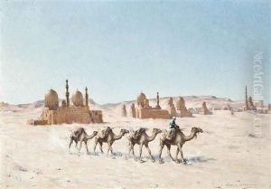 A Camel Train Before A Town In The Desert by Maxime Dastugue