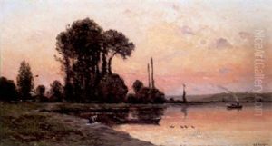 Washing On The Banks Of A River At Sunset