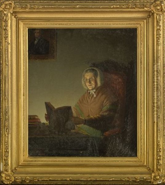 Elderly Woman Seated At A Desk Reading A Book By Candlelight - view 1