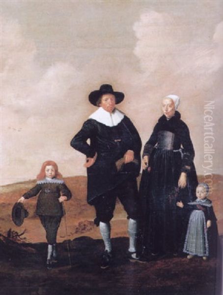 Portrait Of A West Frisian Couple With Their Two Children Standing In A Landscape - view 1