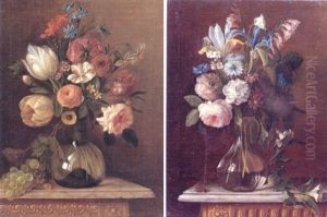 A Still Life Of Tulips, Narcissi, Roses And Other Flowers In A Glass Vase Beside Grapes On A Marble Ledge
