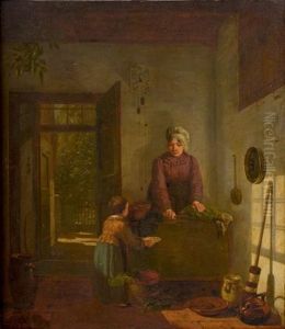 Droljeune Femme Et Sa Fille Dans Une Cuisine