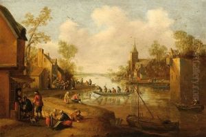 People On A River Embankment In A Village
