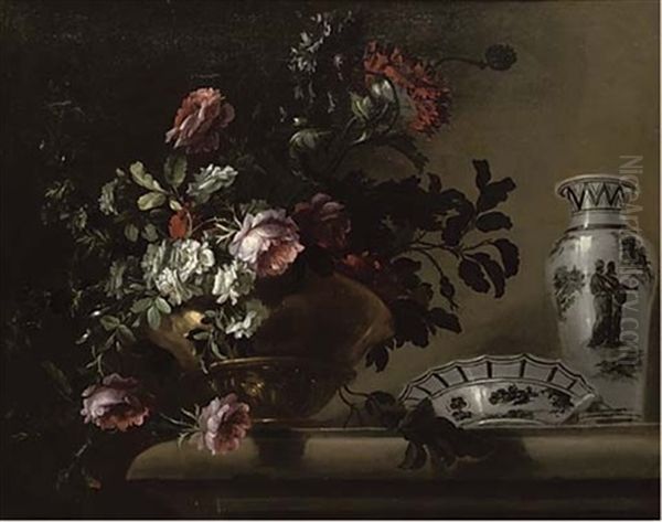 Red And White Roses In A Brass Urn With A Porcelain Bowl And Vase On A Stone Ledge - view 1