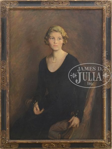 Portrait Of A Seated Young Woman In Black Dress With Pearls - view 1