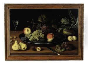 Still Life Of Fruit, Walnuts, Artichokes And A Glass Of Wine On A Table by Jacob Fopsen van Es