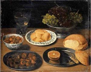 Grapes In A Pewter Bowl, A Roemer Of White Wine, Hazelnuts And Slices Of Butter In Porcelain Dishes, Chestnuts, A Sliced Lemon And A Knife On Pewter Platters, With A Bread Roll On A Wooden Ledge by Georg Flegel