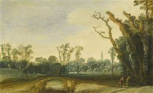 A Wooded Landscape With Figures On A Path Crossing A Bridge, A Village And A Church Spire Beyond A Wooded Landscape With Figures On A Path Crossing A Bridge, A Village And A Church Spire Beyond