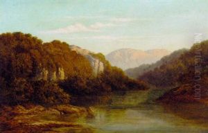 A Wooded River Landscape by Arthur Gilbert