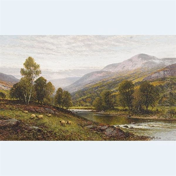 Sheep Grazing With Herders Resting On River's Edge - view 1