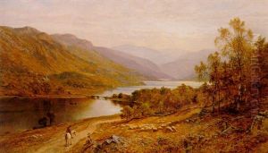 Sheep Grazing In An Extensive Lakeland Landscape
