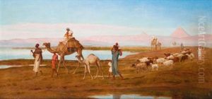 Famille De Fellahs Devant Les Pyramides by Frederick Goodall