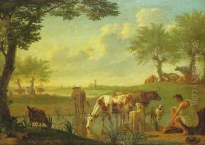 A Pastoral Landscape With A Herdsman Watering His Livestock, A Woman Milking A Cow And Other Cattle Beyond, A River Landscape And Town In The Distance