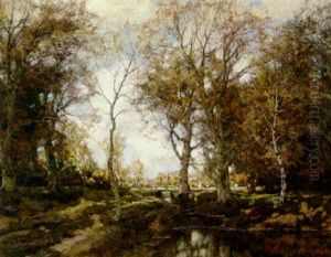 A Pastoral Wooded Scene With Cows Grazing By A Stream by Arnold Marc Gorter