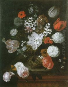 A Still Life Of Tulips, Narcissi, Hyacinths, An Iris And Other Flowers In A Stone Vase Beside A Bird's Nest Standing On A Marble Ledge