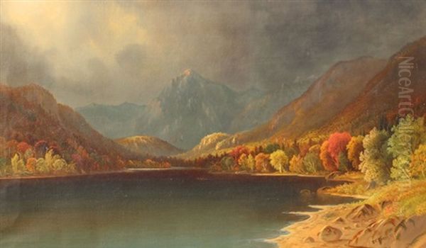 Serene Autumnal Lakeside Scene With Snowcapped Mountains In The Distance And Storm Approaching - view 1