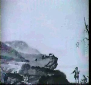 An Extensive Rocky Landscape With Travellers On A Track by Norbert Joseph Carl Grund