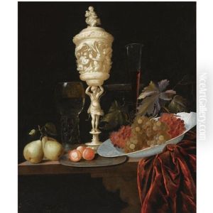 A Still Life With An Ivory Carved Cup And Cover, A Roemer, Pears, Prunes On A Pewter Plate, Grapes In A Porcelain Wan-li Bowl, A Flute-glass And A Tazza, All On A Wooden Ledge Draped With A Red Velvet by Georg Hainz