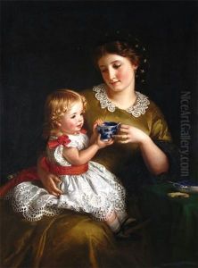 Mother And Her Daughter Having Tea