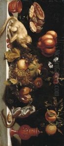Grapes And Pomegranates In A Wicker Basket With Candied Fruit On A Tazza, Earthenware And Two Marmosets On A Stone Ledge And Fruit Suspended From The Wall by Juan Van Der Hamen Y Leon
