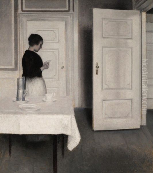 Ida Reading A Letter by Vilhelm Hammershoi