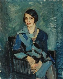 Woman In A Blue Dress Sitting In A Chair by Niels Hansen