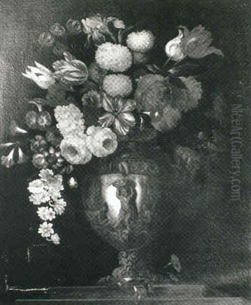 Mixed Flowers In An Urn On A Ledge - view 1