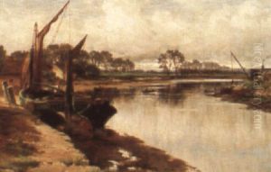 A Sailing Barge By A Creek At Low Tide