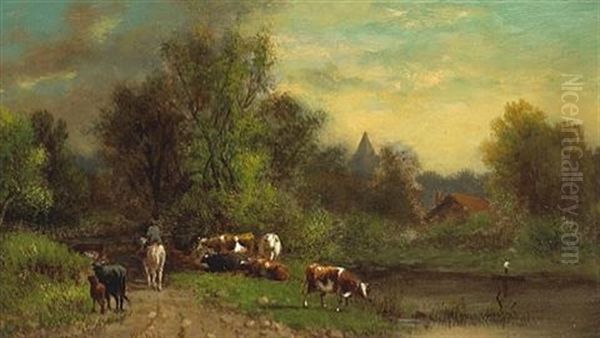 A Man On Horseback With Cattle Nearby - view 1