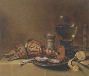 A Roemer, An Overturned Goblet, Oysters On A Pewter Plate, A Silver Salt, A Knife And A Peeled Lemon On A Draped Table by Gerrit Willemsz. Heda