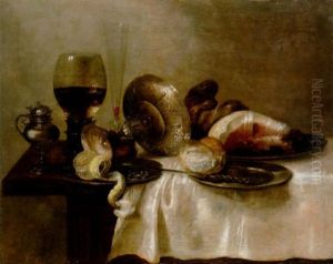 A Half-filled Roemer, A Glass, An Overturned Silver Tazza, A Salt Cellar, A Ham, Bread And Peeled Lemon On Pewter Dishes, On A Table by Willem Claesz Heda