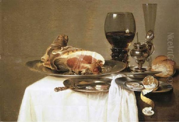 A Ham On A Pewter Platter, And Slices Of Ham And A Knife On A Pewter Plate With A Bowl Of Olives, A Roll On A Table - view 1