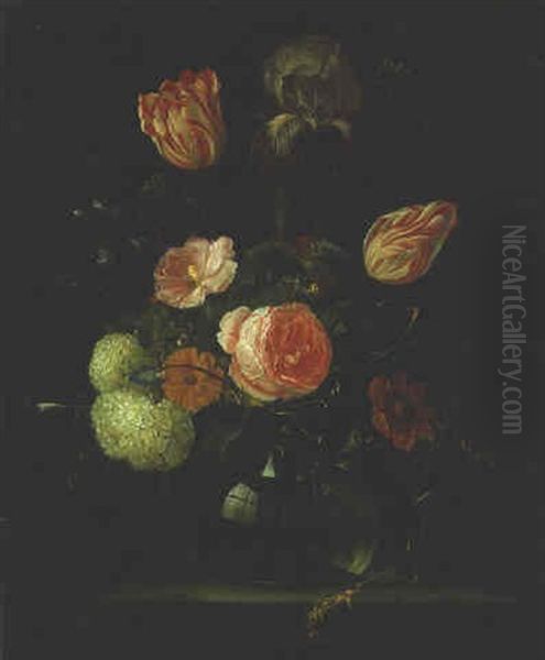 Flowers In A Glass Vase On A Ledge - view 1