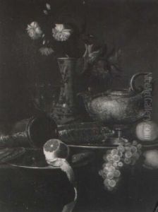 A Draped Table With A Salver, A Peeled Lemon, Grapes And Flowers In A Vase by Jan Davidsz De Heem