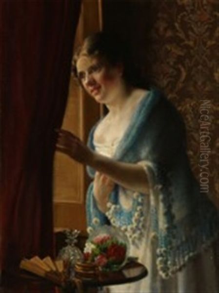 Young Woman Looking Out Of The Window In Anticipation - view 1