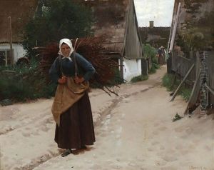 A Woman Carrying Firewood Through A Village